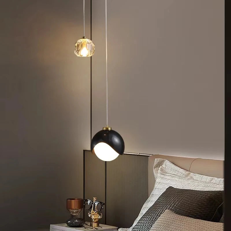 elegant bedside pendant light with crystal and glass accents
