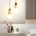 nordic travertine pendant light with natural stone shade
