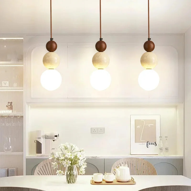 small natural stone chandelier for dining and bar spaces
